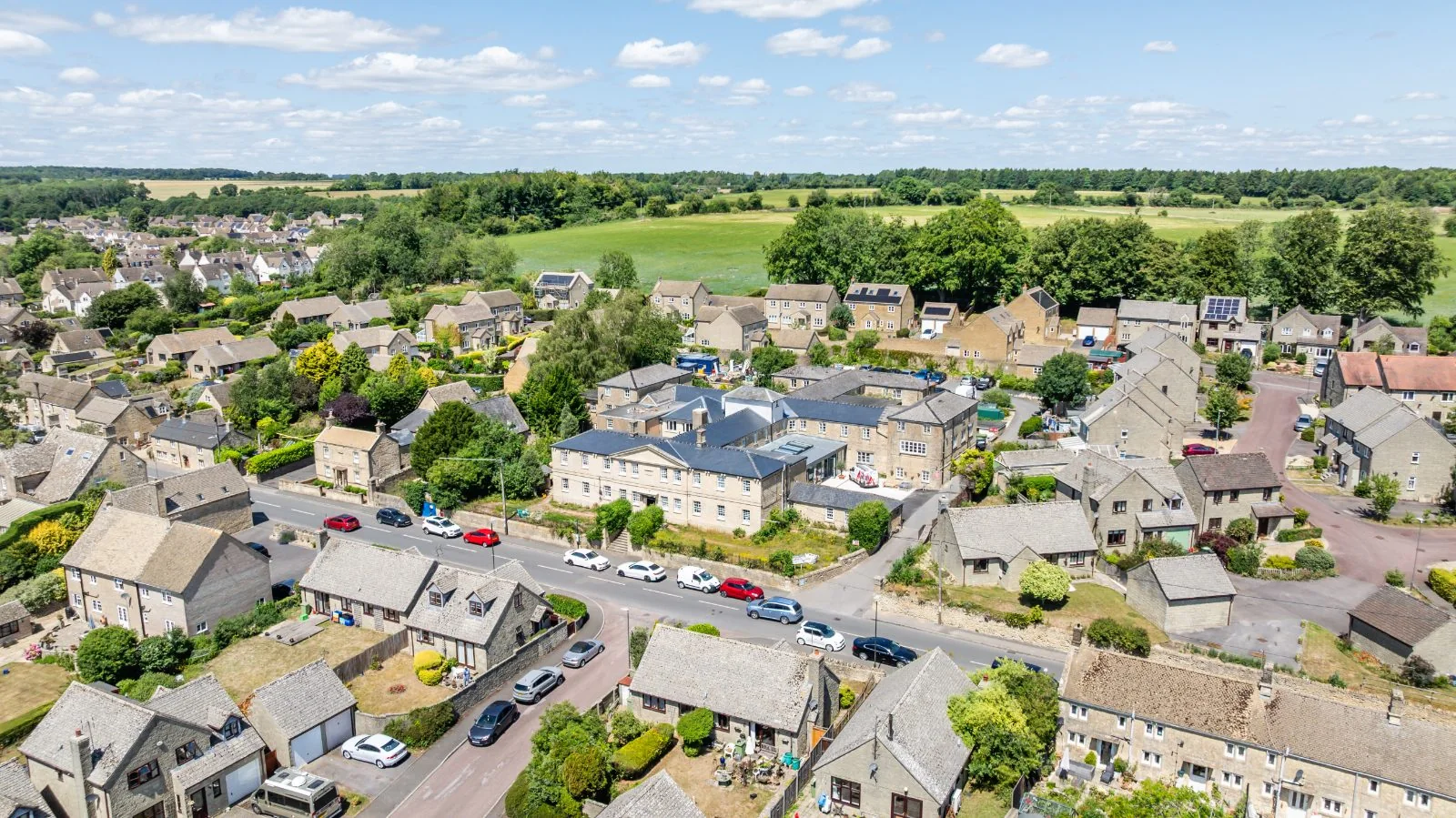 Wide aerial view of Northleach with the home on the High Street